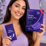 Happy Smile Pro teeth whitening strips held by a smiling woman for at-home teeth whitening and a brighter smile